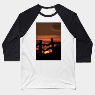 Wooden Fence with a colorful Kansas Sunset Baseball T-Shirt